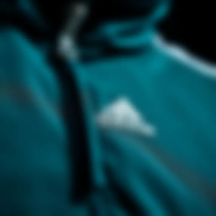 Detail of Adidas Tracksuit Fabric and Stitching Close-up of Adidas tracksuit fabric and stitching