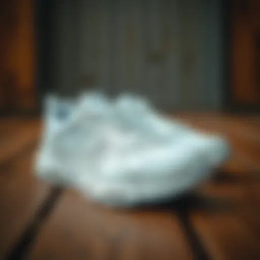 Stylish white Skechers sneakers on a wooden surface