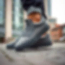 Stylish grey Vans shoes on a modern urban background