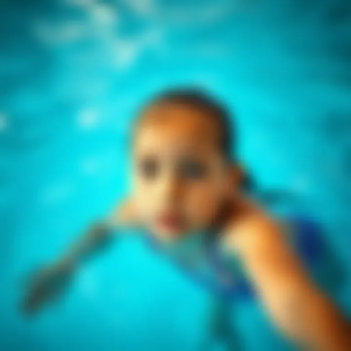 A girl engaging in a swimming lesson, demonstrating confidence in the water.