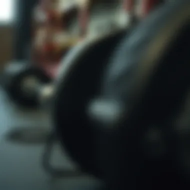 A close-up of a barbell during a deadlift