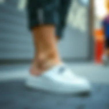 Stylish white Nike slides paired with casual outfit