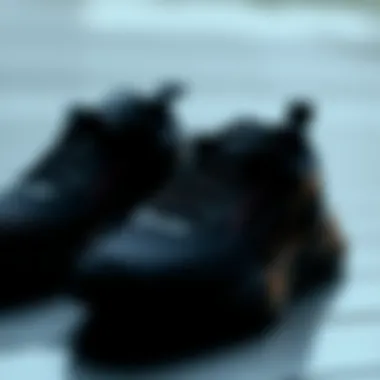 Elegant black sports shoes on a stylish background