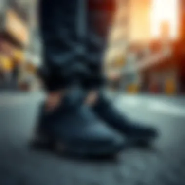 A pair of black stylish sports shoes on a vibrant urban street